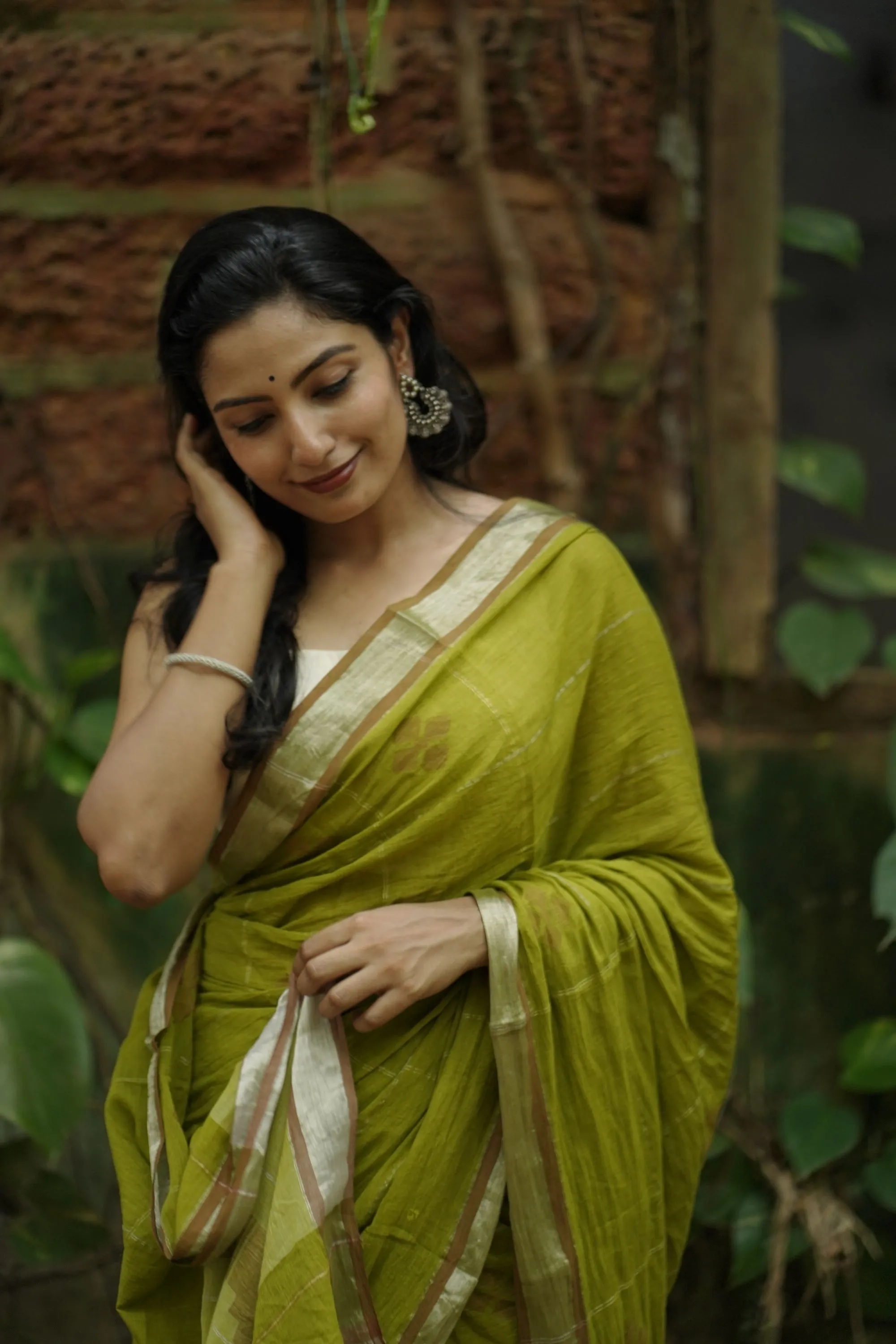 Sitara -light green zari by cotton saree